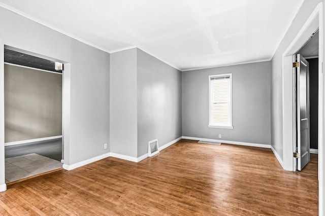 319 60th Ave W, Duluth, MN 55807 - unfurnished bedroom with ornamental molding, wood finished floors, and baseboards