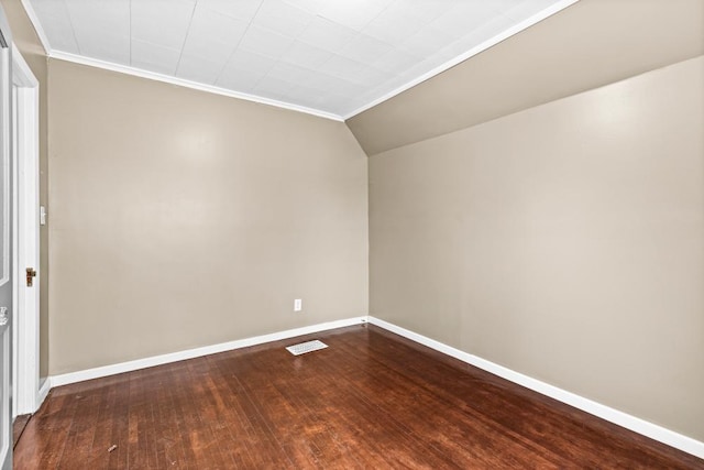 319 60th Ave W, Duluth, MN 55807 - unfurnished room with baseboards, dark wood finished floors, lofted ceiling, and ornamental molding