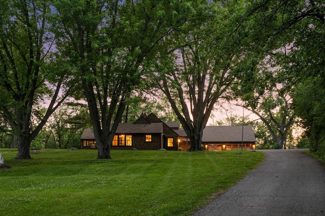 605 Stubbs Bay Rd, Orono, MN 55356 - view of front of house with a front lawn and asphalt driveway