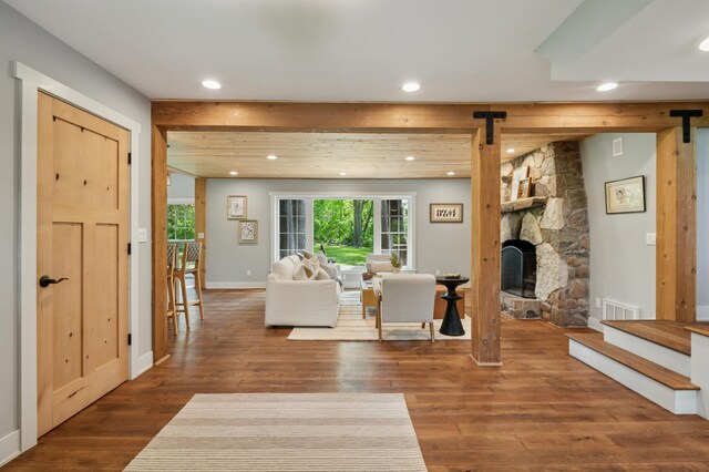 605 Stubbs Bay Rd, Orono, MN 55356 - living area featuring wood finished floors, recessed lighting, a barn door, stairway, and baseboards