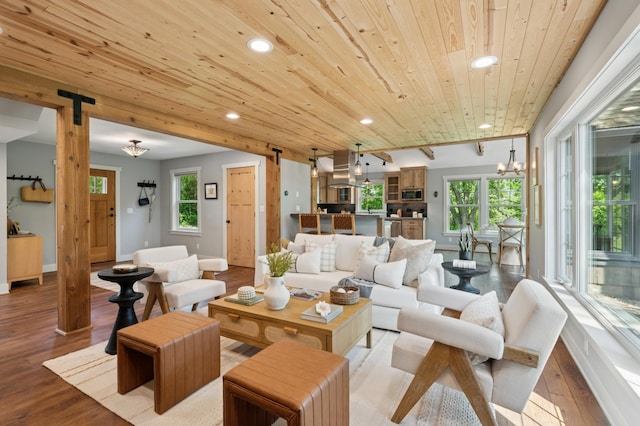 605 Stubbs Bay Rd, Orono, MN 55356 - living room featuring a barn door, wooden ceiling, recessed lighting, light wood-type flooring, and healthy amount of natural light