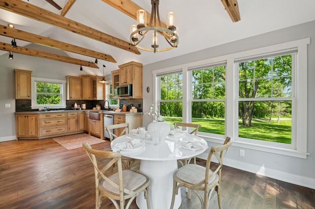 605 Stubbs Bay Rd, Orono, MN 55356 - dining space with a chandelier, baseboards, and hardwood / wood-style flooring