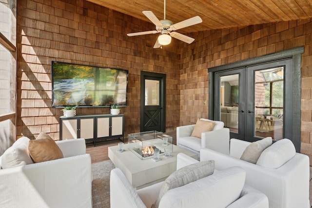 605 Stubbs Bay Rd, Orono, MN 55356 - view of patio / terrace featuring an outdoor living space with a fire pit, french doors, a ceiling fan, and a deck