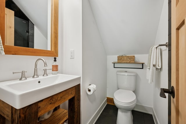 605 Stubbs Bay Rd, Orono, MN 55356 - bathroom featuring lofted ceiling, toilet, baseboards, tile patterned flooring, and vanity