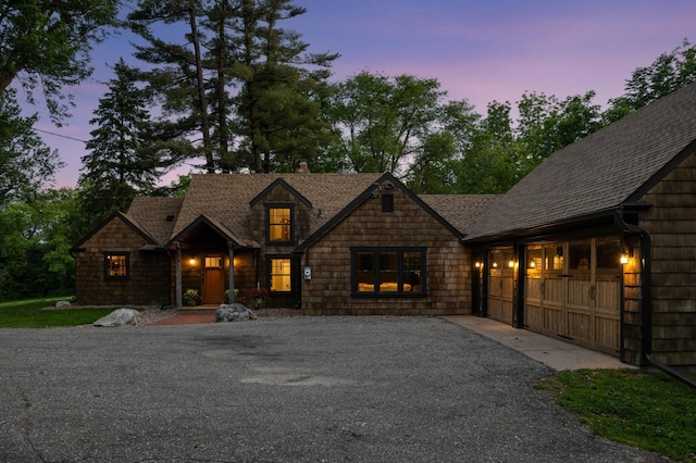 605 Stubbs Bay Rd, Orono, MN 55356 - shingle-style home with roof with shingles and a chimney