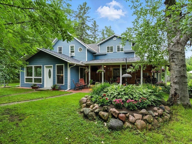 32166 Azure Rd, Scandia Valley Twp, MN 56443 - rear view of house with a lawn, roof with shingles, and a patio
