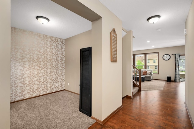15239 Embry Path, Apple Valley, MN 55124 - hall featuring baseboards, wallpapered walls, wood finished floors, and an accent wall