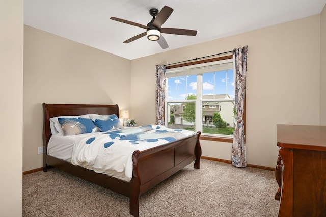 15239 Embry Path, Apple Valley, MN 55124 - bedroom with carpet flooring, baseboards, and a ceiling fan