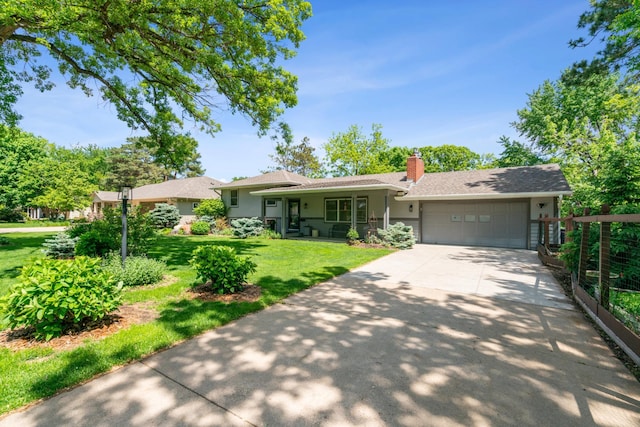 4716 Overlook Dr, Bloomington, MN 55437 - ranch-style home featuring a garage, a chimney, concrete driveway, and covered porch