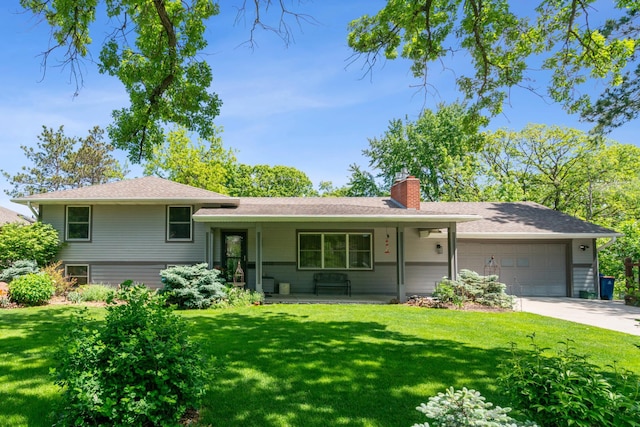4716 Overlook Dr, Bloomington, MN 55437 - split level home with a chimney, an attached garage, a front yard, a porch, and driveway
