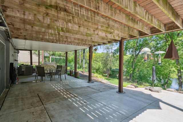 4716 Overlook Dr, Bloomington, MN 55437 - view of patio featuring outdoor dining area and central AC