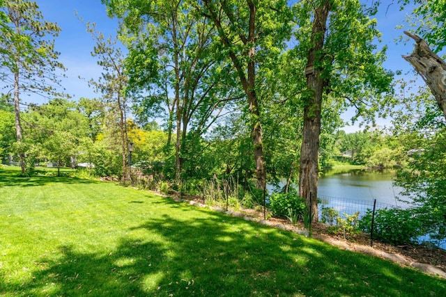 4716 Overlook Dr, Bloomington, MN 55437 - view of grassy yard with a water view