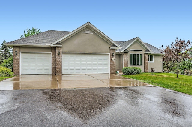 3544 166th Ln NW, Andover, MN 55304 - single story home with concrete driveway, an attached garage, a front lawn, and brick siding