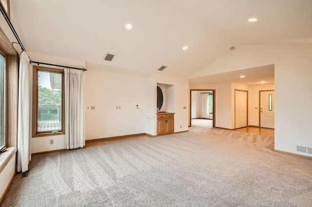 3544 166th Ln NW, Andover, MN 55304 - spare room with light colored carpet, plenty of natural light, baseboards, lofted ceiling, and recessed lighting