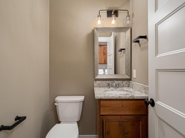 20713 Tamarack St NW, Oak Grove, MN 55011 - half bathroom featuring toilet and vanity