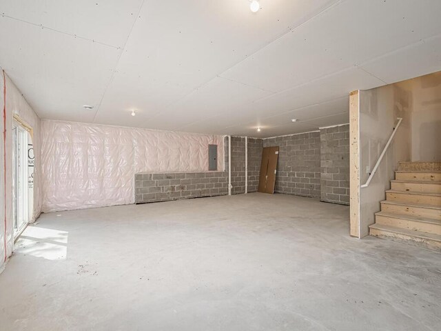20713 Tamarack St NW, Oak Grove, MN 55011 - below grade area featuring stairway and electric panel