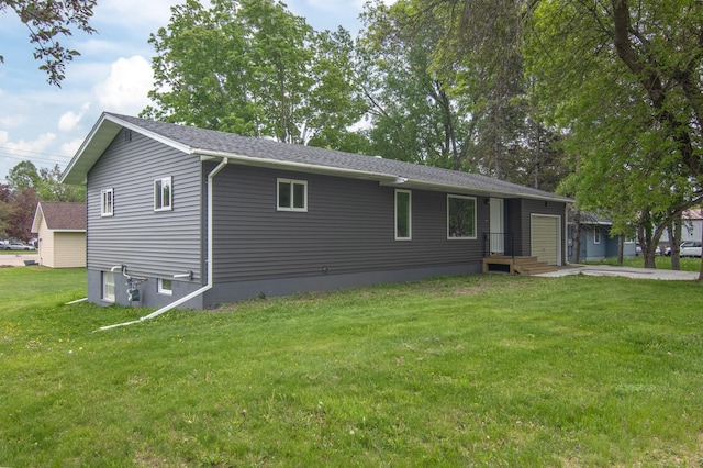 619 Aspen Ave S, Amery, WI 54001 - view of front of house with a garage and a front yard