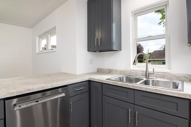 619 Aspen Ave S, Amery, WI 54001 - kitchen with dishwasher, a sink, light countertops, and gray cabinets
