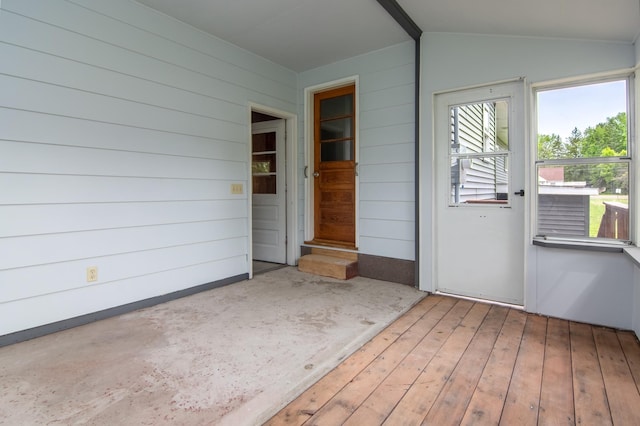 619 Aspen Ave S, Amery, WI 54001 - unfurnished sunroom featuring lofted ceiling