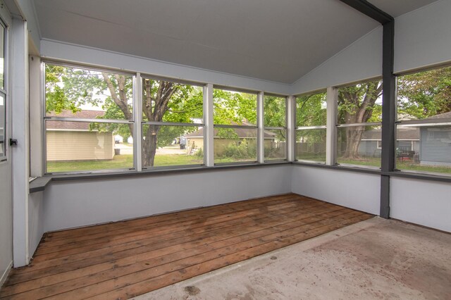 619 Aspen Ave S, Amery, WI 54001 - unfurnished sunroom featuring lofted ceiling