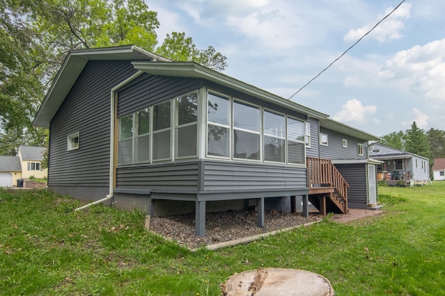 619 Aspen Ave S, Amery, WI 54001 - back of property featuring a lawn and stairs