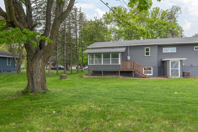 619 Aspen Ave S, Amery, WI 54001 - rear view of property with a sunroom, a yard, stairway, and roof with shingles