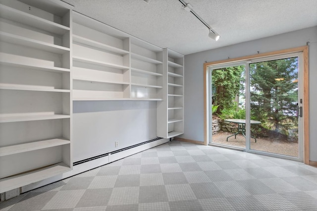 364 Owasso Blvd N, Shoreview, MN 55126 - carpeted spare room featuring track lighting, a textured ceiling, and baseboards
