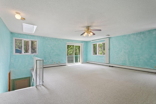 364 Owasso Blvd N, Shoreview, MN 55126 - unfurnished room with baseboard heating, a baseboard heating unit, ceiling fan, carpet floors, and a textured ceiling