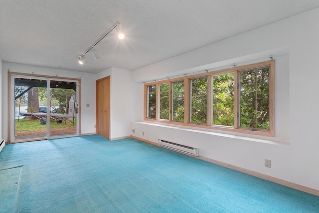 364 Owasso Blvd N, Shoreview, MN 55126 - empty room featuring a baseboard heating unit, baseboards, and carpet flooring