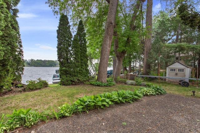 364 Owasso Blvd N, Shoreview, MN 55126 - view of yard featuring a water view and an outdoor structure