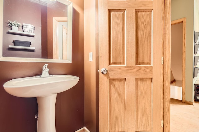 12729 Eagle St NW, Coon Rapids, MN 55448 - bathroom with wood finished floors