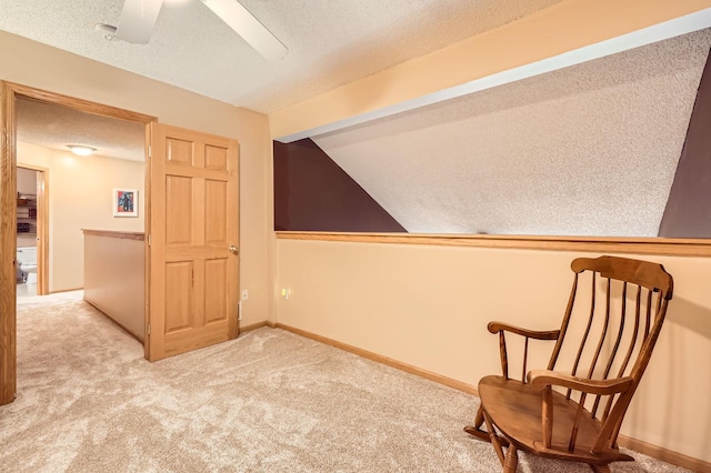 12729 Eagle St NW, Coon Rapids, MN 55448 - unfurnished room featuring a textured ceiling, carpet, vaulted ceiling, a ceiling fan, and baseboards