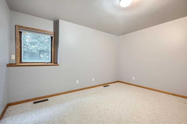 701 Parkview Ln N, Champlin, MN 55316 - empty room with baseboards and carpet floors