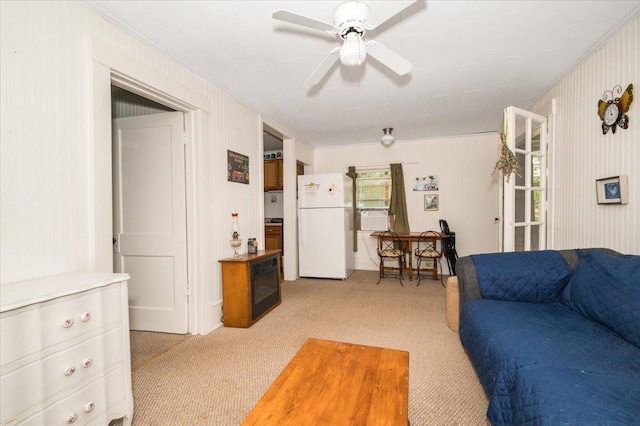 9298 Park Ave, Solon Springs, WI 54873 - carpeted living room featuring a ceiling fan, cooling unit, and ornamental molding