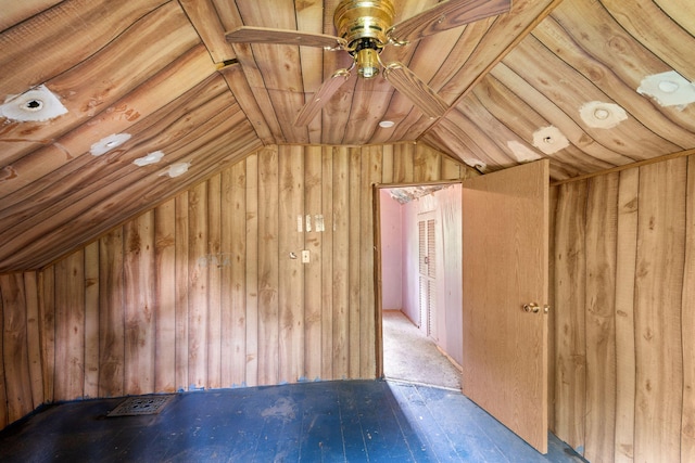 318 Austin Ave, Litchfield, MN 55355 - additional living space featuring lofted ceiling, wood walls, a ceiling fan, and hardwood / wood-style flooring