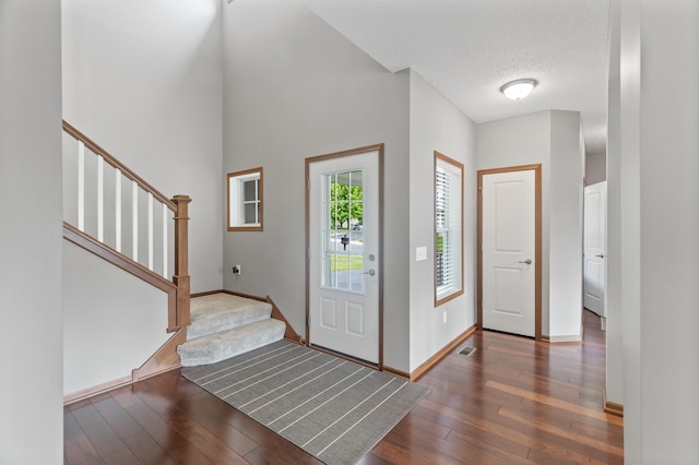 4231 Maple Hurst Dr N, Rockford, MN 55373 - entrance foyer featuring hardwood / wood-style flooring, stairway, and a textured ceiling
