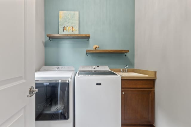 4231 Maple Hurst Dr N, Rockford, MN 55373 - laundry area with independent washer and dryer and cabinet space