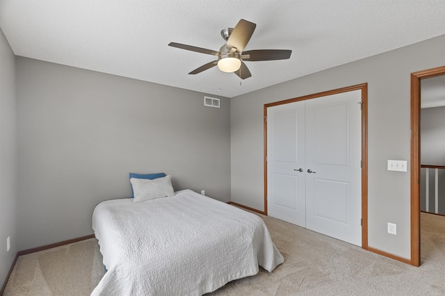 4231 Maple Hurst Dr N, Rockford, MN 55373 - bedroom featuring carpet floors, a closet, and ceiling fan