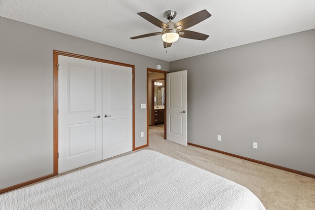 4231 Maple Hurst Dr N, Rockford, MN 55373 - bedroom featuring light carpet, a closet, and a ceiling fan