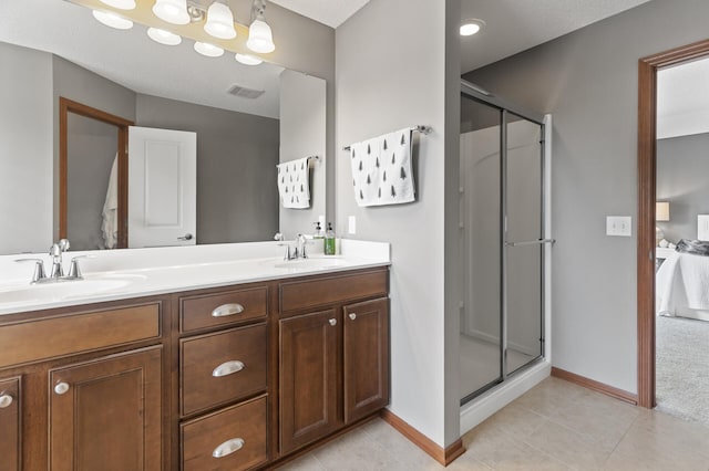 4231 Maple Hurst Dr N, Rockford, MN 55373 - bathroom featuring a shower stall, double vanity, and tile patterned floors
