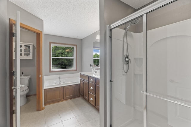 4231 Maple Hurst Dr N, Rockford, MN 55373 - bathroom with a bath, a shower stall, tile patterned floors, a textured ceiling, and vanity