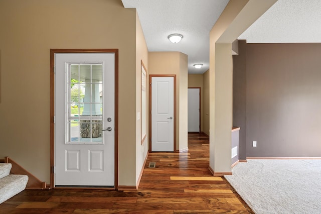 4231 Maple Hurst Dr N, Rockford, MN 55373 - foyer with wood finished floors, a textured ceiling, and stairway
