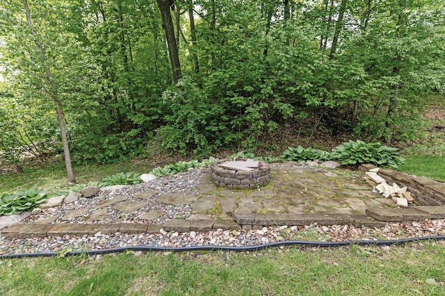 4231 Maple Hurst Dr N, Rockford, MN 55373 - view of yard featuring a fire pit and a patio