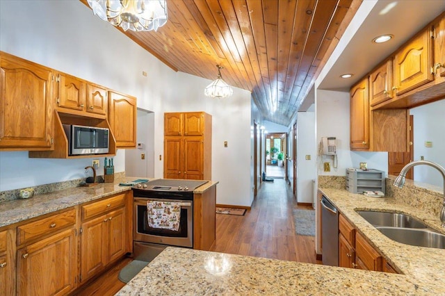 11567 S Lake Blvd, Lake Nebagamon, WI 54849 - kitchen featuring appliances with stainless steel finishes, a chandelier, a sink, wooden ceiling, and light stone countertops