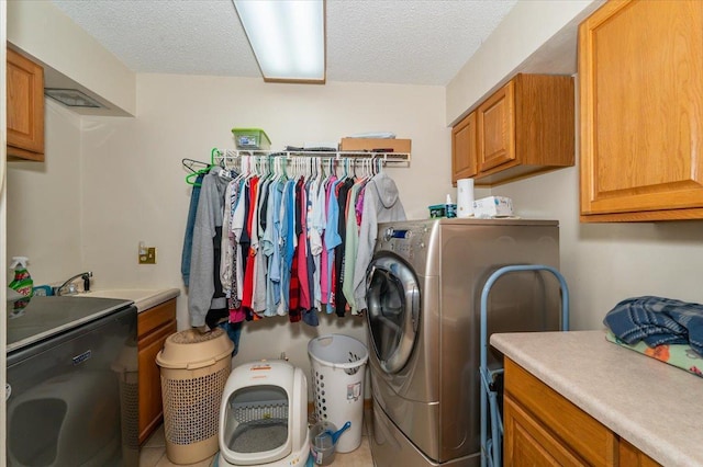 11567 S Lake Blvd, Lake Nebagamon, WI 54849 - laundry room with cabinet space and a textured ceiling