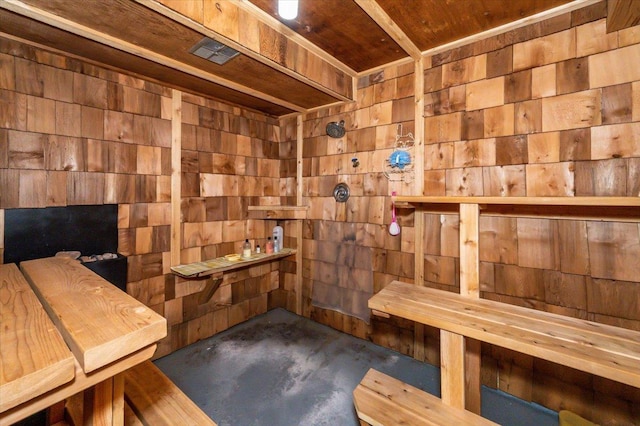 11567 S Lake Blvd, Lake Nebagamon, WI 54849 - relaxing sauna / steam room featuring concrete floors, wood walls, and wood ceiling