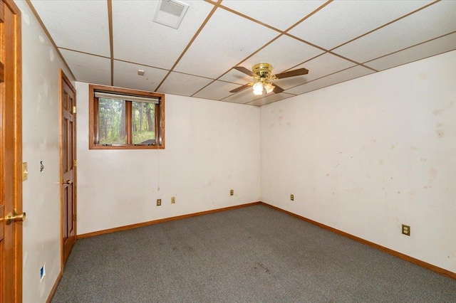 11567 S Lake Blvd, Lake Nebagamon, WI 54849 - carpeted spare room featuring a paneled ceiling, baseboards, and ceiling fan