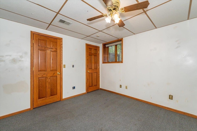11567 S Lake Blvd, Lake Nebagamon, WI 54849 - carpeted spare room with baseboards and ceiling fan