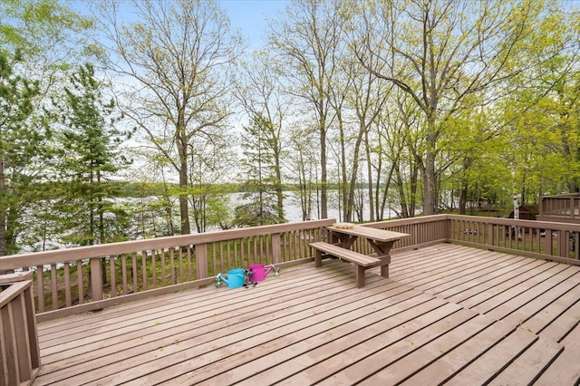 11567 S Lake Blvd, Lake Nebagamon, WI 54849 - wooden terrace with a water view