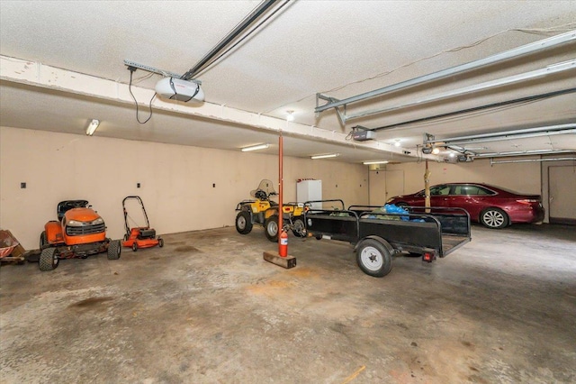 11567 S Lake Blvd, Lake Nebagamon, WI 54849 - garage with a garage door opener